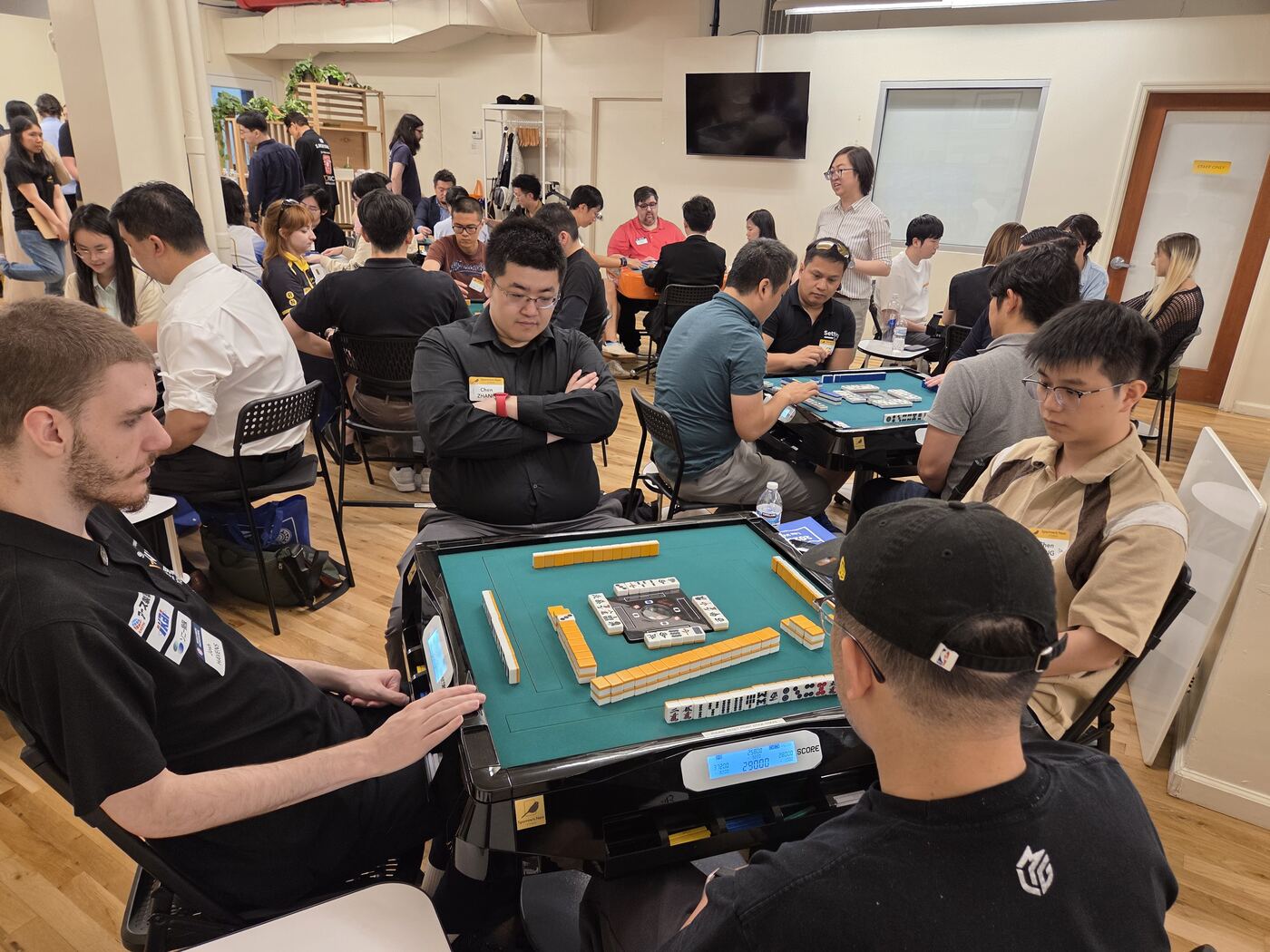 Tournament tables in play across the floor at Sparrow's Nest Studio